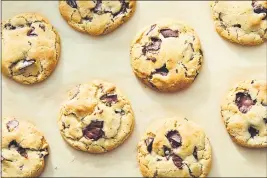  ?? RYAN LIEBE — THE NEWYORK TIMES ?? The dough of these chocolate chip cookies is rolled into balls right away, as opposed to chilling it first, giving them gentle domes in the center.
