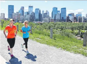  ?? GAVIN YOUNG ?? Runners were enjoying the return to warm sunny weather in Crescent Heights on Wednesday. The rest of the summer is forecast to be warmer and drier.