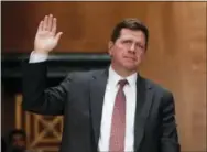  ?? THE ASSOCIATED PRESS ?? Securities and Exchange Commission (SEC) Chairman nominee Jay Clayton is sworn in on Capitol Hill in Washington on Thursday prior to testifying at his confirmati­on hearing before the Senate Banking Committee.