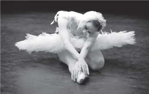  ??  ?? Elaine Mcdonald was acclaimed for roles in several ballet production­s including Swan Lake in the 1980s, above and right. Left, Sir Arthur Bliss, The Master of the Queen’s Musick, with Mcdonald and fellow dancer Kenn Wells during rehearsals for a production in London