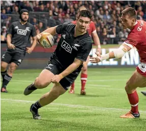  ??  ?? Replacemen­t Jackson Garden-Bachop crosses for one of New Zealand Maori’s seven tries against Canada.