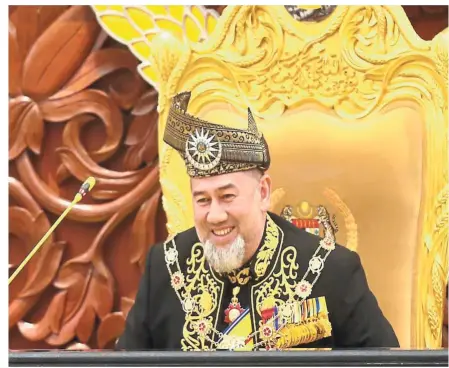  ?? — AZHAR MAHFOF/ The Star ?? Funny moment: Yang Di-Pertuan Agong Sultan Muhammad V making his hilarious remark before delivering the Royal Address during the opening of the first session of the 14th Parliament.