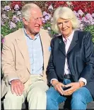  ??  ?? dressing down: Camilla in jeans for her Christmas card with Charles