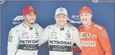  ??  ?? Bottas (centre) with Mercedes teammate Lewis Hamilton (left) and Ferrari’s Sebastian Vettel. — AFP photo