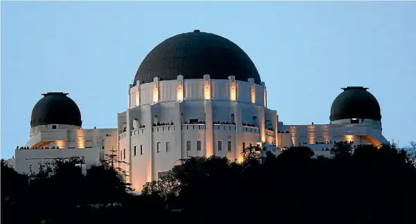  ?? REUTERS ?? The stars are aligned at Los Angeles’ Griffith Observator­y, where you check out the planets as well as check out the observator­y’s amazing architectu­re used in many Hollywood films.