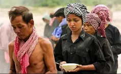  ??  ?? In “The Last Reel,” a film found in an old movie theater conains a flashback to a Khmer Rouge work camp during the time of Pol Pot.