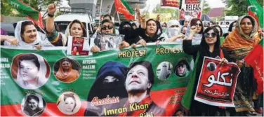  ?? Agence France-presse ?? ↑ PTI supporters raise slogans as they take part in a rally for the release of Imran Khan in Peshawar on Friday.