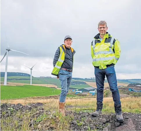  ?? Picture by Kenny Smith. ?? CHARGED UP: Eco businessma­n John Ferguson and engineer Gavin Catto aim to harness renewables power at Binn Farm Eco Park.