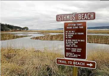  ??  ?? For hikers, birders and kayakers: Isthmus Beach, where Indian and Marrowston­e islands connect, can be reached by a network of trails edging lagoons that host flocks of water birds. Most of the rest of Indian Island is a securely fenced naval munitions...