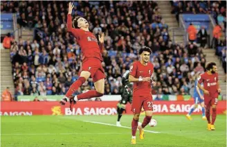  ?? Picture: ANDREW BOYERS/ REUTERS ?? DOUBLE TROUBLE: Liverpool’s Curtis Jones celebrates scoring his second goal in the Premier League match against Leicester City at the King Power Stadium in Leicester on Monday night