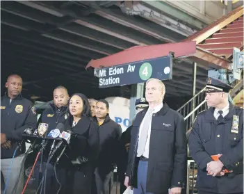  ?? — AFP photo ?? New York Police Department (NYPD) first deputy commission­er Tanya Kinsella talks to the press at the entrance to the Mt. Eden Avenue subway station in the Bronx borough of New York after six people were injured with one person dead following a shooting at the subway station. ”