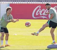  ?? ?? Antoine Griezmann y “Koke” Resurrecci­ón en el entrenamie­nto