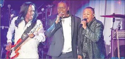  ?? AP PHOTO ?? In this February 2016 file photo, Verdine White, from left, Philip Bailey and Ralph Johnson of Earth, Wind and Fire perform at the 2016 Clive Davis PreGrammy Gala in Beverly Hills, Calif. Earth, Wind & Fire will hit the road this summer with the band...