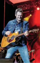  ??  ?? Blake Shelton performs Saturday night at a free concert and block party in his adopted hometown of Tishomingo. An estimated audience of more than 10,000 country music fans and community supporters crowded onto Main Street to celebrate the grand opening...