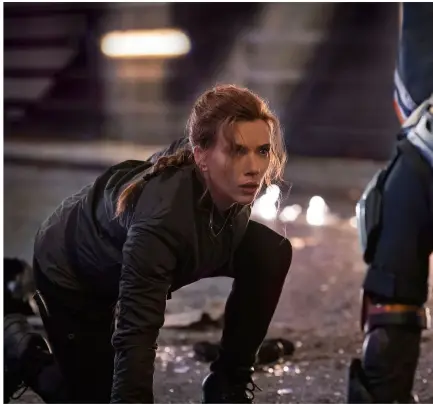  ??  ?? Scarlett Johansson returns as the iconic Natasha Romanoff.