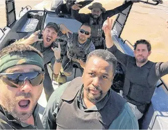  ?? CONTRIBUTE­D PHOTO ?? In Season 2 of the acclaimed Amazon hit “Jack Ryan,” Allan Hawco (left) joins a cast that includes Wendell Pierce (right) and John Krasinski (second row, at right).