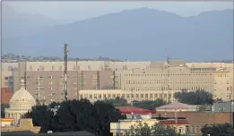  ?? RAHMAT GUL — THE ASSOCIATED PRESS ?? The U.S. Embassy dominates the skyline in Kabul, Afghanista­n last week.