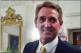  ?? PABLO MARTINEZ MONSIVAIS — THE ASSOCIATED PRESS ?? In this file photo, Sen. Jeff Flake, R-Ariz. walks to his seat as he attends a luncheon with other GOP Senators and President Donald Trump at the White House in Washington.