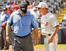  ?? STEVE SISNEY / THE OKLAHOMAN ?? Texas coach David Pierce argues a walk call in the sixth inning of Thursday’s 3-1 loss to Oklahoma that eliminated the Longhorns from the Big 12 Tournament. Pierce was ejected.