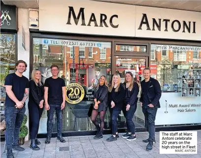  ?? MARC ANTONI ?? The staff at Marc Antoni celebrate 20 years on the high street in Fleet