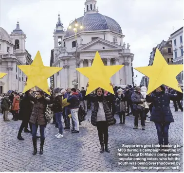  ??  ?? Supporters give their backing to M5S during a campaign meeting in Rome. Luigi Di Maio’s party proved popular among voters who felt the south was being overshadow­ed by the more prosperous north