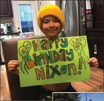  ?? SUBMITTED PHOTOS ?? Beside: Nixon Staples holds a sign made for him after his ninth birthday on on the 27th. Staples received a drive by birthday celebratio­n from a group of dedicated Hatters.
