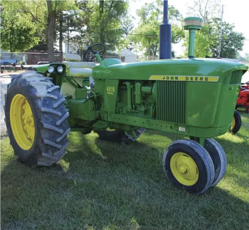  ??  ??  Gary Nagel’s ’61 4010 Rowcrop has Deere’s “Roll-o-matic” knee-action narrow front axle, which was part of the standard rowcrop package. One unusual-to-the-industry feature Deere favored was the side inlets for radiator cooling air, hence the side...