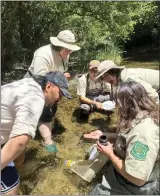  ?? COURTESY OF THE U.S. FOREST SERVICE ?? U.S. Forest Service staff members teach field rangers in the Angeles National Forest in July.