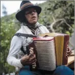  ?? ?? Salvador, an Arhuaco Indigenous man, plays the accordion Jan. 16 in Nabusimake.