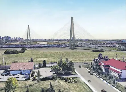  ??  ?? A rendering of the proposed cable-stayed LRT bridge over the Yellowhead Trail and CN Rail yards.