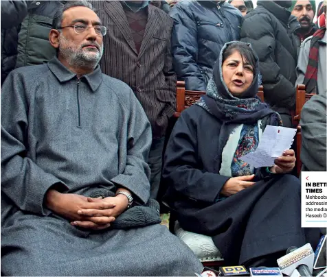  ?? ABID BHAT ?? IN BETTER TIMES Mehbooba Mufti addressing the media with Haseeb Drabu