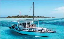  ?? EXPLORE ?? Above: Trek through the desert in Morocco, where On the Go Tours offers a Kasbahs, Kids & Camels trip. Left: Explore the Maldives by cruising on a dhoni, a traditiona­l sailpowere­d boat, in a seven-day voyage offered by Explore.