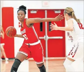  ?? OKLAHOMAN] ?? Chantae Embry, left, will play for Norman this season. She transferre­d from Prague, where she helped the Red Devils make the state tournament. [NATE BILLINGS, THE