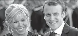  ?? AFP ?? French President Emmanuel Macron with wife Brigitte Macron during an event