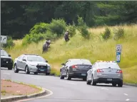  ?? Kendra Baker / Hearst Connecticu­t Media ?? Danbury and state police respond to an officerinv­olved shooting on Old Ridgebury Road on July 3.