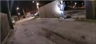  ?? CHICAGO POLICE DEPARTMENT VIA AP ?? This image from Chicago Police Department body cam video shows the moment before Chicago Police officer Eric Stillman fatally shot Adam Toledo, 13, on March 29, 2021, in Chicago.