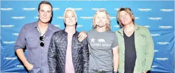  ??  ?? (Left to right) Robert DeLeo, Gutt, Eric Kretz, and Dean DeLeo of Stone Temple Pilots pose backstage during SiriusXM Presents Stone Temple Pilots Live from the Troubadour on Tuesday in Los Angeles, California. — AFP photo
