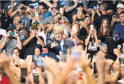  ?? MANDEL NGAN/AFP/GETTY IMAGES ?? “Whatever happened to honest reporting?” President Donald Trump asked at a rally in Wilkes-Barre, Penn., on Thursday.