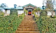  ?? ?? Up the steps: A warm welcome awaits at this colonial bungalow