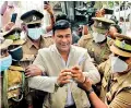  ?? PIX BY PRADEEP DILRUKSHAN­A ?? MP Ranjan Ramanayake, who was sentenced to four years rigorous imprisonme­nt for contempt of court was seen taken to the Pallansena Quarantine Center.