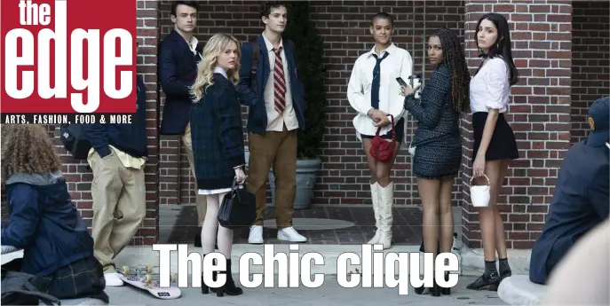  ??  ?? BOOTS AND BAGS: Elite students Max Wolfe (Thomas Doherty), Audrey Hope (Emily Alyn Lind), Otto Bergman (Eli Brown), Julien Calloway (Jordan Alexander), Monet de Haan (Savannah Lee Smith) and Luna La (Zion Moreno), from left are the new well-dressed in-crowd in the reboot of ‘Gossip Girl.’