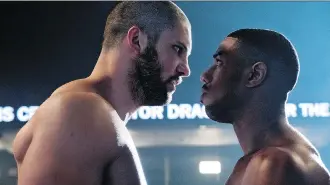  ?? MGM ?? Florian Munteanu, as Viktor Drago, left, and Michael B. Jordan as Adonis Creed, face off in Creed II.