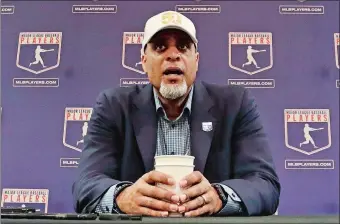  ?? MORRY GASH/AP PHOTO ?? In this Feb. 19, 2017, file photo, Tony Clark, executive director of the Major League Players Associatio­n, answers questions at a news conference in Phoenix.