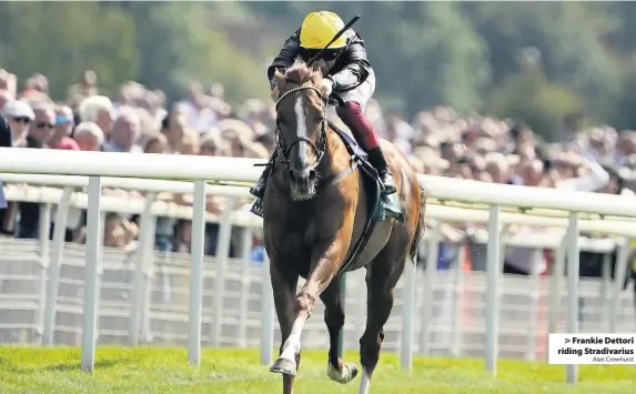  ?? Alan Crowhurst ?? Frankie Dettori riding Stradivari­us