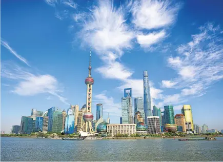  ??  ?? Futuristic Shanghai is within reach of Kiwi travellers for just $ 699 return, or Honolulu ( inset) for the same. Kirsty Wynn