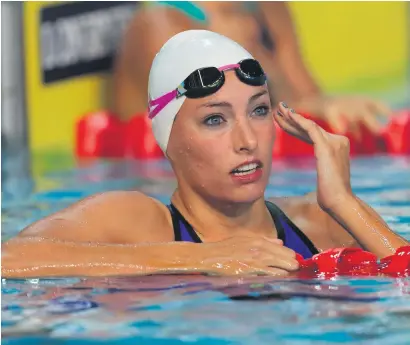  ?? Picture: Gallo Images ?? GOLDEN GIRL. South Africa’s latest swimming sensation, Tatjana Schoenmake­r, has not come down to earth yet after her golden double at the Commonweal­th Games on the Gold Coast.