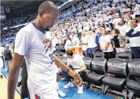  ?? THE OKLAHOMAN]
[PHOTOS BY NATE BILLINGS AND SARAH PHIPPS, ?? Thunder forward Kevin Durant missed 26 shots and committed seven turnovers in OKC’s Game 2 loss Monday night to the Mavericks.