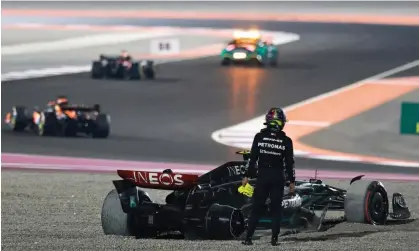  ?? George.” ?? Lewis Hamilton’s race ended on the first turn after he turned into George Russell. Photograph: Qian Jun/MB Media/Getty Images
The pair are both contracted to Mercedes