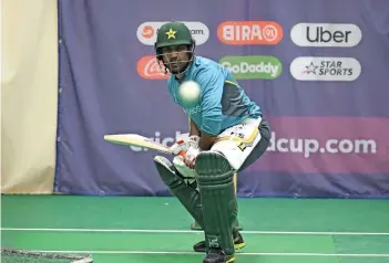  ?? AFP ?? Sarfraz Ahmed bats during an indoor net session at Old Trafford on Friday. —