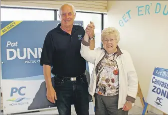  ?? SUEANN MUSICK/THE NEWS ?? Pat Dunn, PC candidate for Pictou Centre, is greeted by longtime volunteer and supporter Jean Murray, who brings the campaign team homemade biscuits and oatcakes on a regular basis.